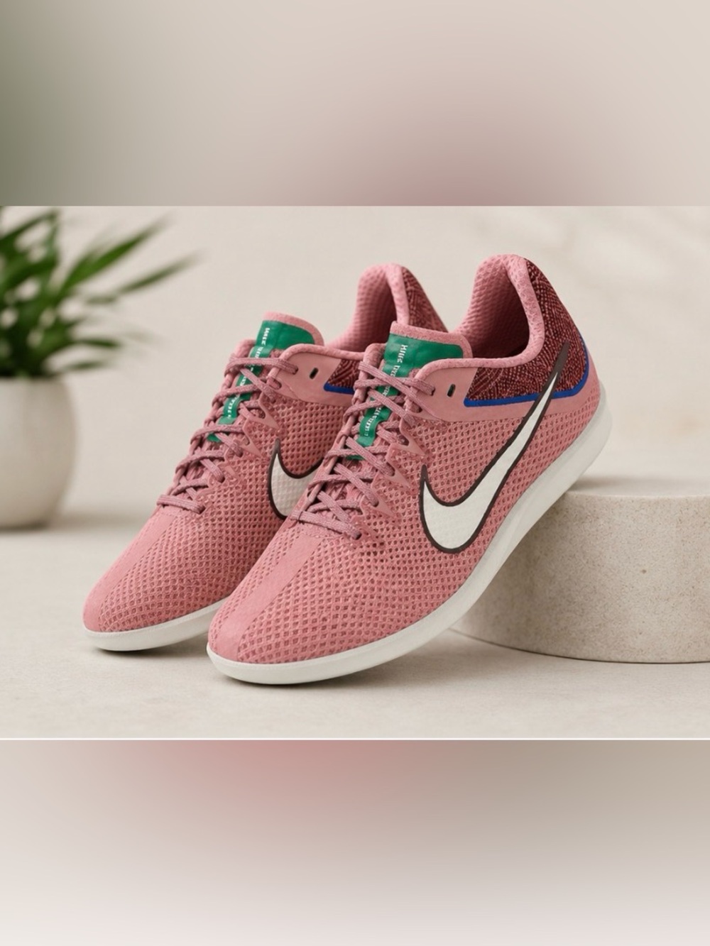 Nike Pink Mesh Athletic Sneakers with White Swoosh and Green Tongue
